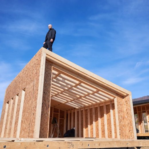 man-inspecting-quality-of-building-wooden-frame-ho-2022-08-19-07-12-06-utc-e1667393617486.jpg
